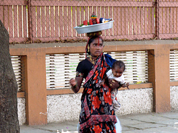 Outside the Institute, a tribal woman came to beg for money.